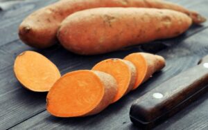 sweet-potatoes-chopped-on-a-wood - Daily Health Tips: Simple Tricks for a Healthier Life Sweet Potato